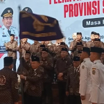 Prosesi penyerahan petaka DHD BPK 45 Sumatera Utara yang diterima ketua umum, Letjen TNI (Purn) Muhammad Hasyim. (Foto: RRI/Joko)